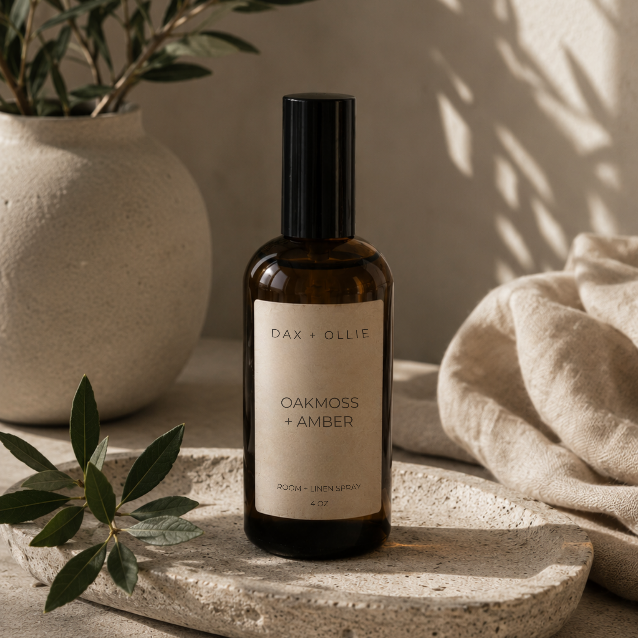 Oakmoss + Amber room and linen spray in amber glass bottle by Dax + Ollie